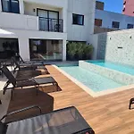 Studio novo, moderno e aconchegante, no centro